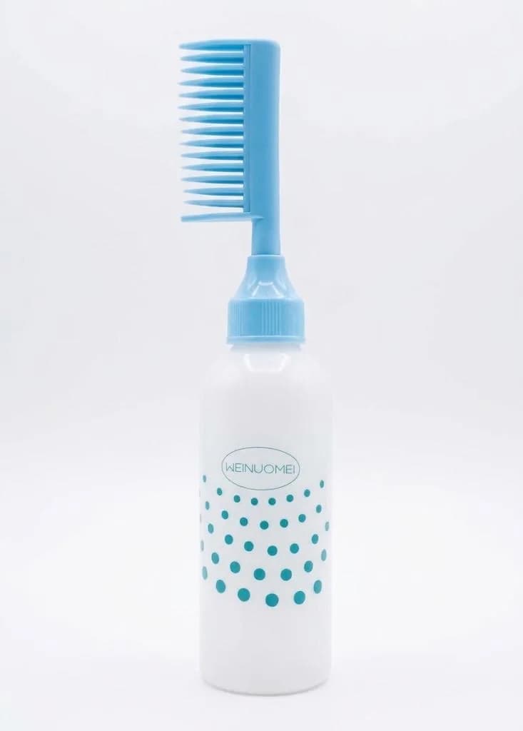 BOUTEILLE AVEC PEIGNE EN PLASTIQUE