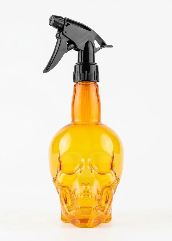 VAPORISATEUR DE BARBIER EN FORME DE TETE DE MORT